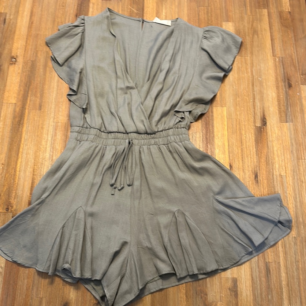 Gorgeous green romper size S from Altered State never worn.  Perfect for Summer